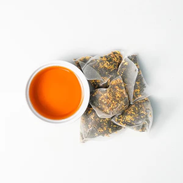 Ngoại hình túi trà khô và màu nước trà Osmanthus Túi Lọc
